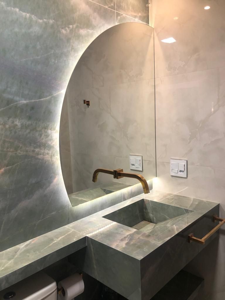 Lavabo com mármore verde e cuba esculpida